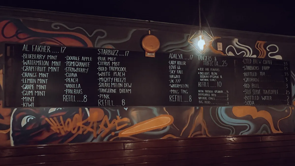 The flavor chalkboard at Haze Hookah Cafe